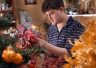 Gossett--HolidayWreaths--4 copy  Matthew Gossett works on a Christmas wreath in his shop at the Gossett home in Spartanburg, Friday, 9-1-06. Gossett, who has fragile X syndrome, makes dozens of wreaths and holiday ornaments and Christmas trees. His mother Dianne hosts a celebration every year for people to stop by and look at and buy the holiday ornaments.  (NOTE: with KIM KIMZEY story/ for SPARTANBURG_MAGAZINE)